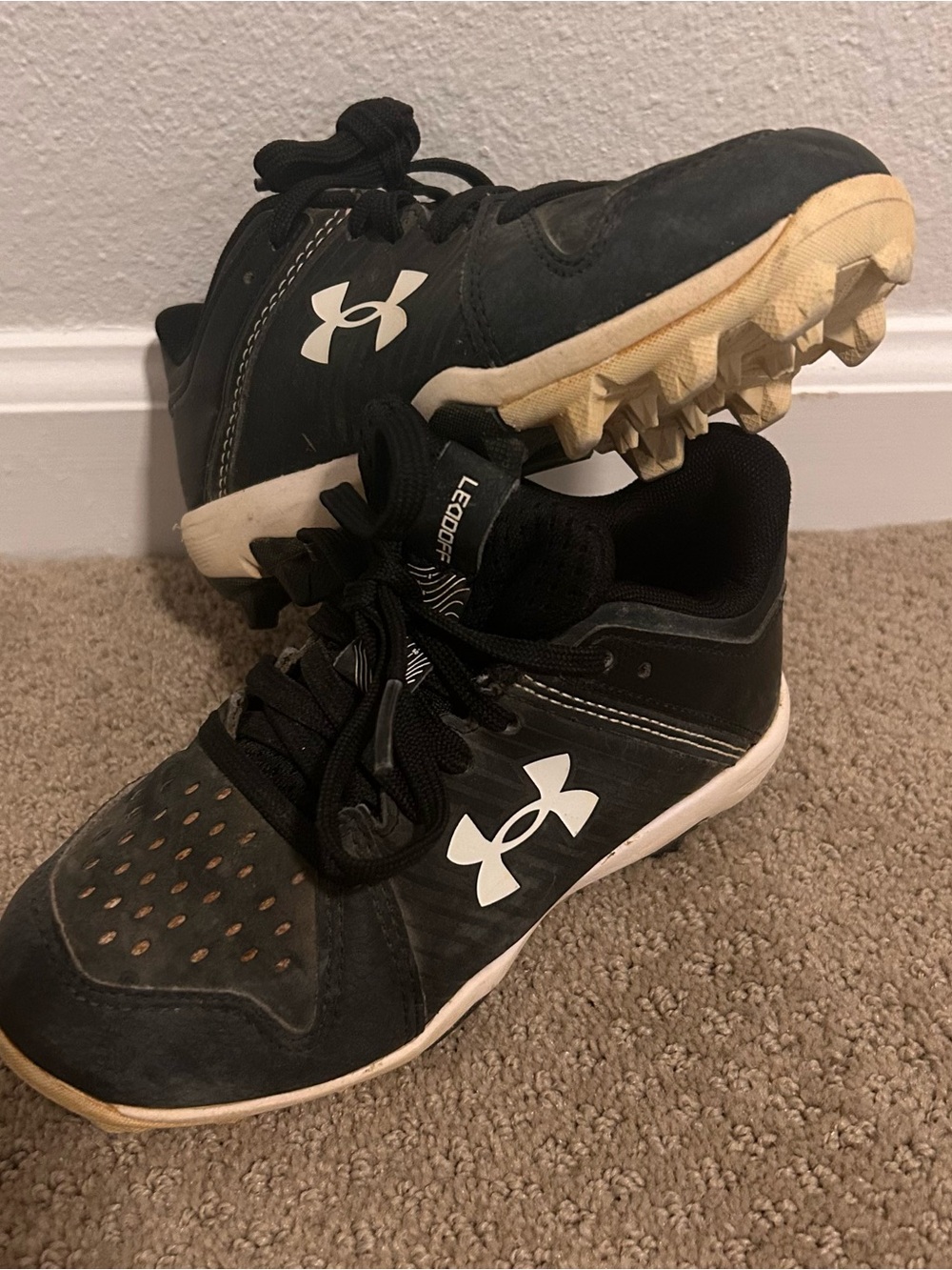 Under Armour Kids Black and White Athletic Cleats